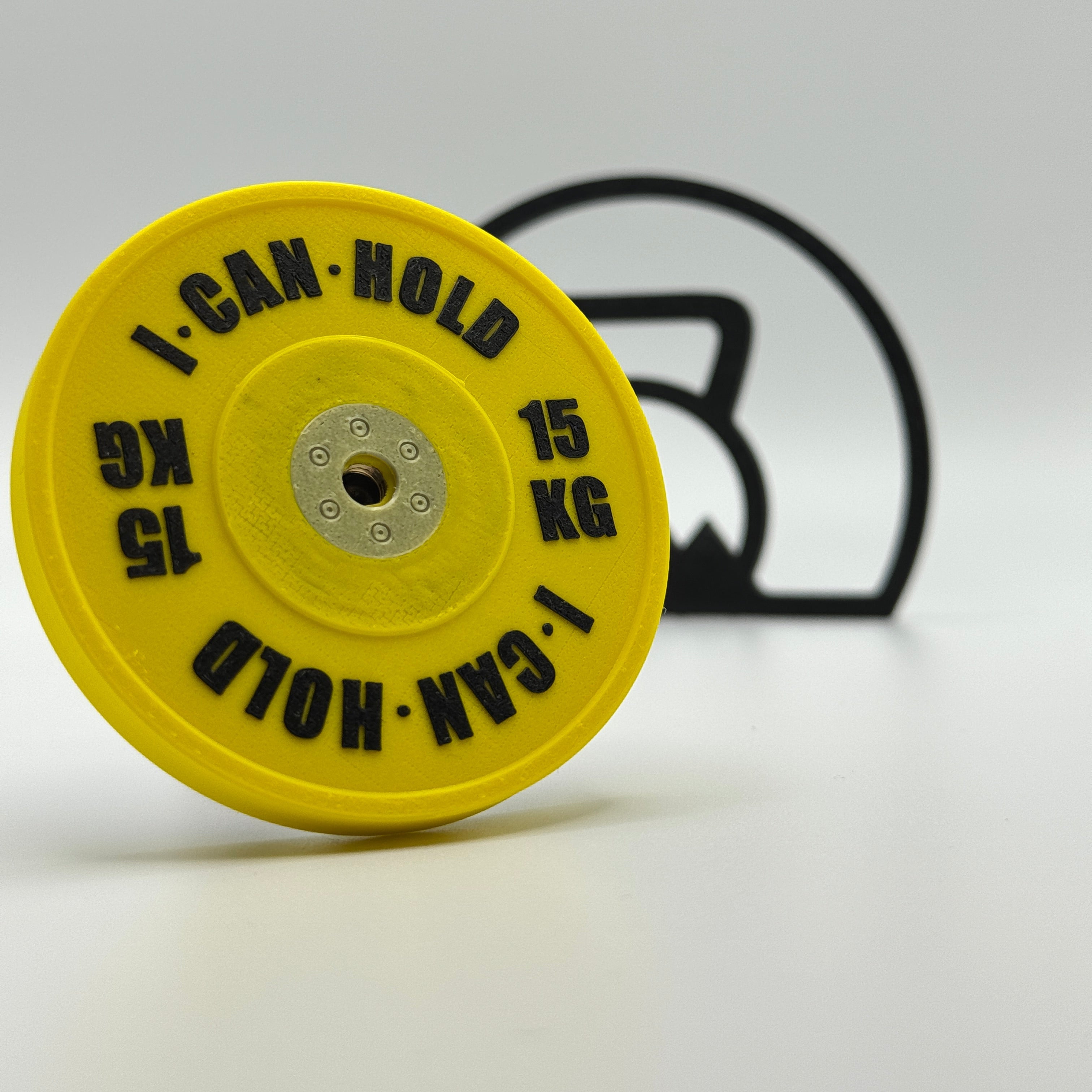 I•CAN•HOLD 15kg Yellow Edition, die MagSafe Handyhalterung für's Gym in der vorderen schrägen Ansicht.